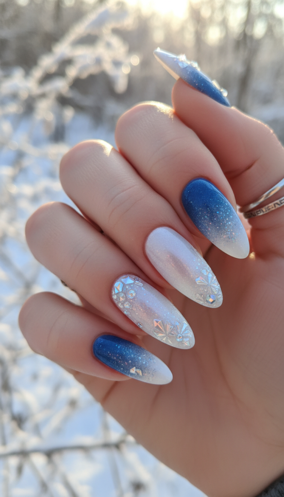 A close-up view of a beautifully manicured hand showcasing crystalline frost nail art on long, elegant nails. The design features a gradient from icy blue to shimmering white, with intricate crystalline patterns resembling frostflakes delicately scattered across a glossy French tip. The foreground highlights the brilliance of the nail art, with soft glimmers and reflections catching the light. The middle features a light, frosted background that evokes a winter theme, subtly illuminated by soft, diffused natural light, creating an ethereal atmosphere. The image is shot at a slight angle to emphasize the nail details while maintaining a clean and polished aesthetic. The mood is serene and enchanting, perfect for winter fashion. A close-up view of a beautifully manicured hand showcasing crystalline frost nail art on long, elegant nails. The design features a gradient from icy blue to shimmering white, with intricate crystalline patterns resembling frostflakes delicately scattered across a glossy French tip. The foreground highlights the brilliance of the nail art, with soft glimmers and reflections catching the light. The middle features a light, frosted background that evokes a winter theme, subtly illuminated by soft, diffused natural light, creating an ethereal atmosphere. The image is shot at a slight angle to emphasize the nail details while maintaining a clean and polished aesthetic. The mood is serene and enchanting, perfect for winter fashion.